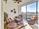 Enjoy outdoor living on this balcony with comfortable seating, offering a relaxing space with a pleasant view at 7305 River Hammock Dr # 204, Bradenton, FL 34212