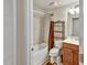 Standard bathroom with a shower-tub combination, commode and a single sink vanity at 7305 River Hammock Dr # 204, Bradenton, FL 34212