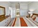 Comfortable bedroom featuring a large bed, neutral tones, and ample space for a peaceful retreat at 7305 River Hammock Dr # 204, Bradenton, FL 34212