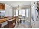 Bright breakfast nook with bay window and seating for four at 7305 River Hammock Dr # 204, Bradenton, FL 34212