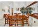 Formal dining room features a large wooden table and elegant decor at 7305 River Hammock Dr # 204, Bradenton, FL 34212