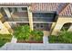 Beautiful condominium featuring screened balconies and lush tropical landscaping at 7305 River Hammock Dr # 204, Bradenton, FL 34212