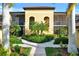Well-maintained condo building featuring screened balconies and professionally manicured grounds at 7305 River Hammock Dr # 204, Bradenton, FL 34212