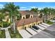 Beautiful townhomes with garages, tile roofs, and lush landscaping in a desirable community at 7305 River Hammock Dr # 204, Bradenton, FL 34212