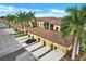 Beautiful townhomes with garages, tile roofs, and lush landscaping in a desirable community at 7305 River Hammock Dr # 204, Bradenton, FL 34212