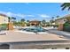 Relaxing community pool area with ample seating and a covered pavilion, ideal for gatherings at 7305 River Hammock Dr # 204, Bradenton, FL 34212