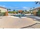 Well-maintained community pool surrounded by lush landscaping and comfortable seating for residents at 7305 River Hammock Dr # 204, Bradenton, FL 34212