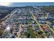 Beautiful aerial view of waterfront community with canal access and numerous homes with docks at 7309 Islander Ln, Hudson, FL 34667