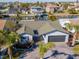 Single-Gathering home with well-maintained landscaping, attached garage, and waterfront access at 7309 Islander Ln, Hudson, FL 34667