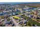 Highlighted canal-front property with private dock, offering direct access to waterways and nearby bay at 7309 Islander Ln, Hudson, FL 34667