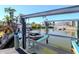 A private boat lift with waterfront access adds to the appeal of this home near tropical landscaping and picturesque canals at 7309 Islander Ln, Hudson, FL 34667