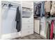 Organized walk-in closet with ample shelving, drawers, and hanging space for clothing and accessories at 7309 Islander Ln, Hudson, FL 34667