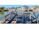 View from the boat dock overlooks the canal, showcasing the desirable waterfront location at 7309 Islander Ln, Hudson, FL 34667