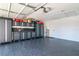 Large garage featuring custom built-in cabinets and plenty of storage space at 7309 Islander Ln, Hudson, FL 34667