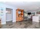 Open living space featuring wood floors, a neutral color palette, and modern furnishings at 7309 Islander Ln, Hudson, FL 34667