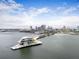Stunning aerial view of a modern pier and downtown skyline, offering picturesque waterfront scenery at 105 4Th Ne Ave # 405, St Petersburg, FL 33701