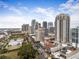 Expansive aerial view capturing the cityscape, with a mix of high-rise buildings and lush greenery at 105 4Th Ne Ave # 405, St Petersburg, FL 33701