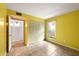 Bedroom with tile flooring, window view, and closet at 105 4Th Ne Ave # 405, St Petersburg, FL 33701