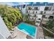 Aerial view of community pool offering a refreshing escape and lounge area at 105 4Th Ne Ave # 405, St Petersburg, FL 33701