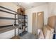 An empty and unfinished storage area with metal shelving and various size boxes at 105 4Th Ne Ave # 405, St Petersburg, FL 33701