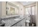 Bathroom with granite countertops and modern fixtures at 1131 60Th Ave S, St Petersburg, FL 33705