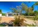 Charming single-story home with a well-maintained lawn, a brick driveway, and mature landscaping at 1131 60Th Ave S, St Petersburg, FL 33705