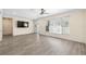 Bright living room with large window and hardwood floors at 1131 60Th Ave S, St Petersburg, FL 33705