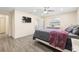 Main bedroom with mounted TV at 1131 60Th Ave S, St Petersburg, FL 33705