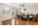 Cozy sun room featuring tile flooring, a ceiling fan, and lots of natural light at 1131 60Th Ave S, St Petersburg, FL 33705