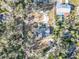 An aerial shot offering a bird's-eye view of the house and the backyard at 11335 Mcmullen Loop, Riverview, FL 33569