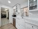 The kitchen area features a stainless steel dishwasher and sink at 11335 Mcmullen Loop, Riverview, FL 33569