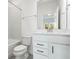 Bright bathroom with a bathtub, quartz countertops, tile floors, and neutral walls at 12652 Glenn Creek Dr, Riverview, FL 33569