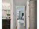 Hallway view of the bedroom and bathroom, showing the layout of the space at 1390 Gulf Blvd # 102, Clearwater, FL 33767