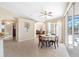 Bright dining area featuring tile floors and views of the backyard at 182 Rotonda N Blvd, Rotonda West, FL 33947