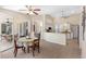 Open kitchen and dining area with tile flooring and views of the pool at 182 Rotonda N Blvd, Rotonda West, FL 33947