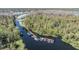 Overhead shot showcases a pool, waterway access, and convenient boat parking at 2511 Dolly Bay Dr # 304, Palm Harbor, FL 34684