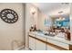 Dry bar with a sink and cabinets; adjacent to dining area at 2511 Dolly Bay Dr # 304, Palm Harbor, FL 34684