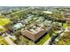 Resort-style community pool with tennis courts and mature trees; a great place for relaxation and recreation at 30 Stanton Cir, Oldsmar, FL 34677