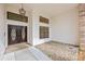 Stylish front entrance showcasing a double door with decorative glass and sidelight windows at 30 Stanton Cir, Oldsmar, FL 34677