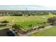 Aerial view of the lush Golf Course with sand traps, fairways, and putting greens at 30 Stanton Cir, Oldsmar, FL 34677