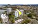 Aerial view of a condo with a community pool, plenty of parking, and convenient highway access at 30 Turner St # 203, Clearwater, FL 33756