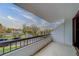 A balcony with railings overlooks a street and surrounding neighborhood at 30 Turner St # 203, Clearwater, FL 33756