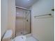 Bathroom featuring a glass enclosed walk-in shower with tile walls at 30 Turner St # 203, Clearwater, FL 33756