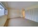 Neutral bedroom features ample natural light and closet space at 30 Turner St # 203, Clearwater, FL 33756