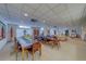 Spacious common room area with multiple tables and seating, ideal for gatherings and community events at 30 Turner St # 203, Clearwater, FL 33756