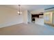 Bright, airy dining room featuring neutral colors and a modern light fixture at 30 Turner St # 203, Clearwater, FL 33756