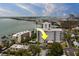 The exterior elevation shows the condo's proximity to the bay and a community pool at 30 Turner St # 203, Clearwater, FL 33756