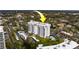 The condo's exterior elevation showcases a community pool and nearby street access at 30 Turner St # 203, Clearwater, FL 33756