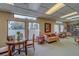 Community library featuring comfortable seating areas and ample bookshelves for residents to enjoy at 30 Turner St # 203, Clearwater, FL 33756