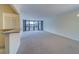Bright living room with large sliding doors to the balcony that let in lots of natural light at 30 Turner St # 203, Clearwater, FL 33756